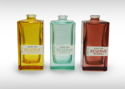 Tru Fragrance: Glass — spray UV coating / pressure sensitive label